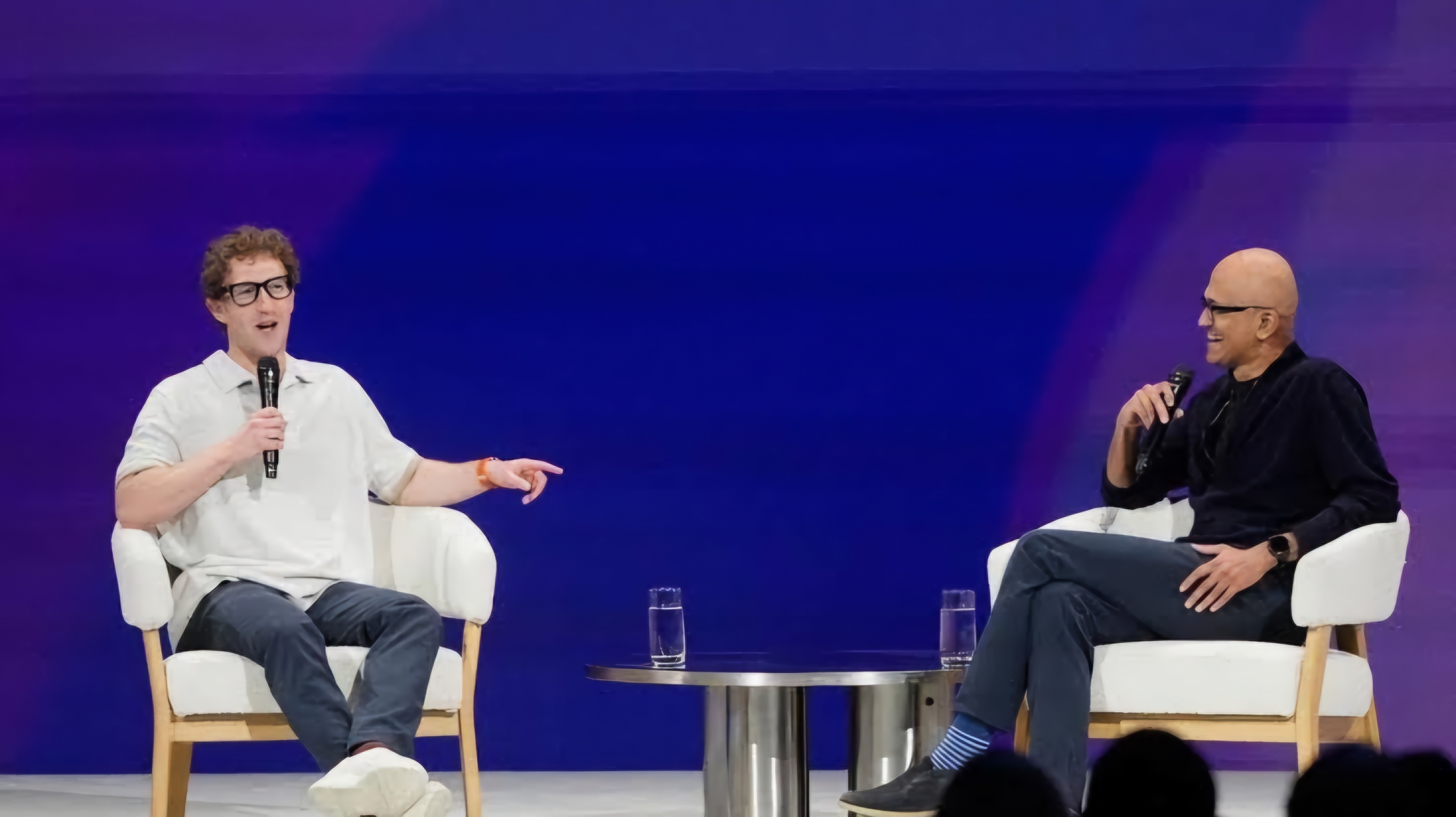 Interview between Meta's Zuckerberg and Microsoft's CEO Nadella. (Photo Credit: AP)